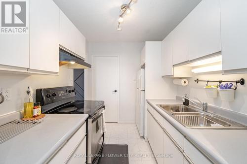 616 - 2929 Aquitaine Avenue, Mississauga, ON - Indoor Photo Showing Kitchen With Double Sink