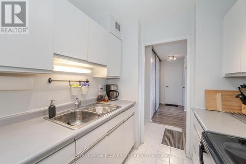 #616 -2929 Aquitaine Ave, Mississauga, ON - Indoor Photo Showing Kitchen With Double Sink