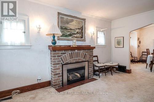 27 Willingdon Ave, London, ON - Indoor Photo Showing Living Room With Fireplace