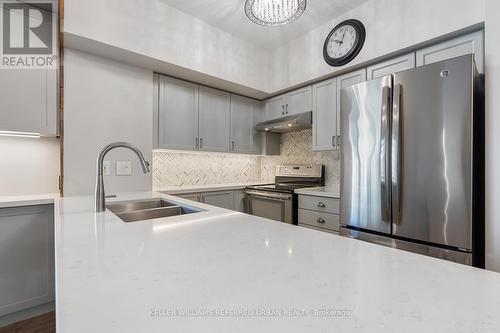 #409 -2121 Lake Shore Blvd W, Toronto, ON - Indoor Photo Showing Kitchen With Stainless Steel Kitchen With Double Sink With Upgraded Kitchen