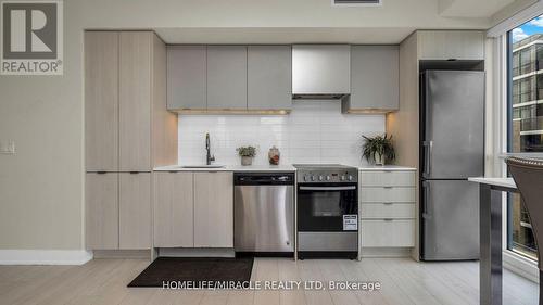 #744 -26 Gibbs Rd, Toronto, ON - Indoor Photo Showing Kitchen With Stainless Steel Kitchen With Upgraded Kitchen