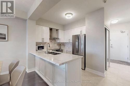 #328 -10211 Keele St, Vaughan, ON - Indoor Photo Showing Kitchen With Double Sink