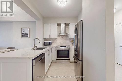 #328 -10211 Keele St, Vaughan, ON - Indoor Photo Showing Kitchen With Double Sink With Upgraded Kitchen