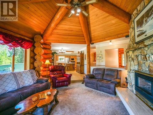 4845 Ten Mile Lake Road, Quesnel, BC - Indoor Photo Showing Living Room With Fireplace