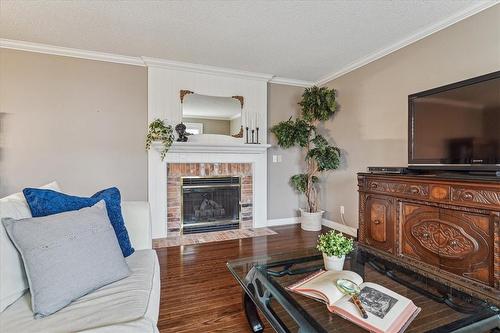 4667 Portage Road|Unit #14, Niagara Falls, ON - Indoor Photo Showing Living Room With Fireplace