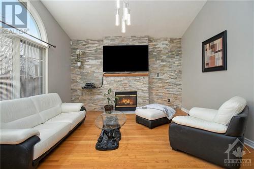 102 Stoneway Drive, Ottawa, ON - Indoor Photo Showing Living Room With Fireplace