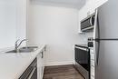 5055 Greenlane Road|Unit #617, Beamsville, ON  - Indoor Photo Showing Kitchen With Stainless Steel Kitchen With Double Sink 