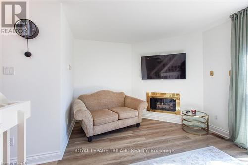 #7 -1399 Commissioners Rd W, London, ON - Indoor Photo Showing Living Room With Fireplace
