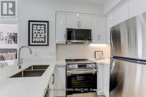 #1409 -60 Disera Dr S, Vaughan, ON - Indoor Photo Showing Kitchen With Double Sink With Upgraded Kitchen