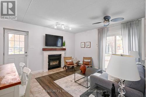 28 - 17 Dawson Drive, Collingwood, ON - Indoor Photo Showing Living Room With Fireplace