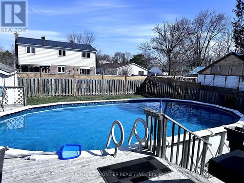 12 Mckeown Street, New Tecumseth, ON - Outdoor With Above Ground Pool With Backyard
