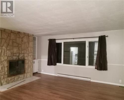 440 Pleasant Ridge, Rogersville, NB - Indoor Photo Showing Living Room With Fireplace