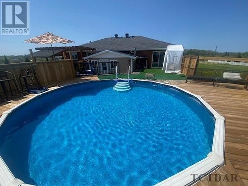 2360 Jaguar Dr, Timmins, ON - Outdoor With Above Ground Pool With Backyard