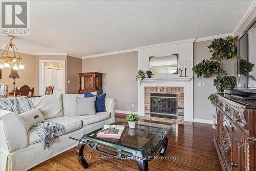 #14 -4667 Portage Rd, Niagara Falls, ON - Indoor Photo Showing Living Room With Fireplace