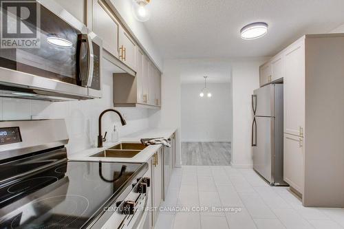 #22 -760 Berkshire Dr, London, ON - Indoor Photo Showing Kitchen With Double Sink