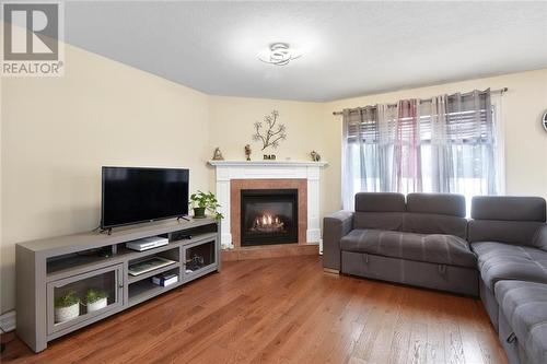 1039 Fitzsimmons Drive, Brockville, ON - Indoor Photo Showing Living Room With Fireplace