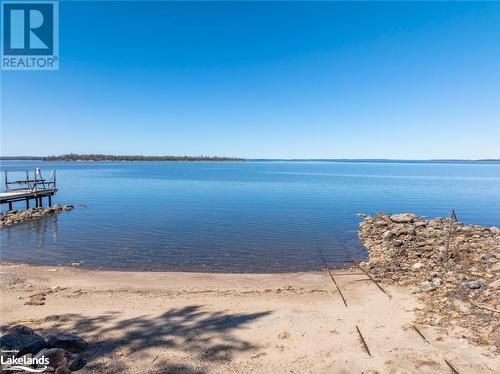 Sandy Beach with Marine Railway - 96 Robins Point Road, Victoria Harbour, ON - Outdoor With Body Of Water With View
