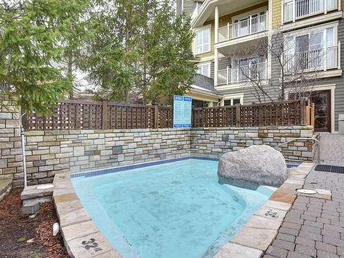 Spa - 319-150 Ch. Du Curé-Deslauriers, Mont-Tremblant, QC - Outdoor With In Ground Pool