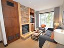 Salon - 319-150 Ch. Du Curé-Deslauriers, Mont-Tremblant, QC  - Indoor Photo Showing Living Room With Fireplace 