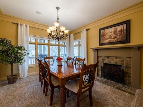 300 Mariposa Crt, Kamloops, BC - Indoor Photo Showing Dining Room With Fireplace
