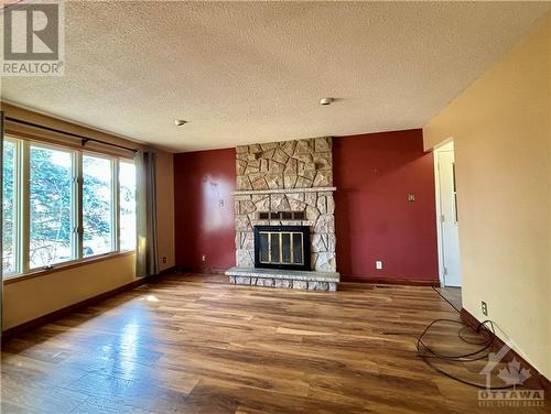 245 Queen Street W, Chesterville, ON - Indoor Photo Showing Living Room With Fireplace