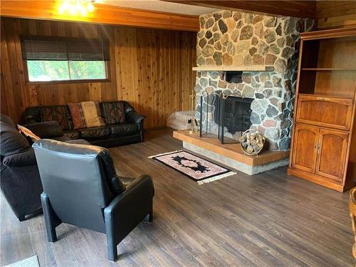 50 Lakeview Road, Pelican Lake, MB - Indoor Photo Showing Living Room With Fireplace