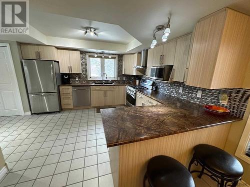 17 Furlong St, Kirkland Lake, ON - Indoor Photo Showing Kitchen With Double Sink