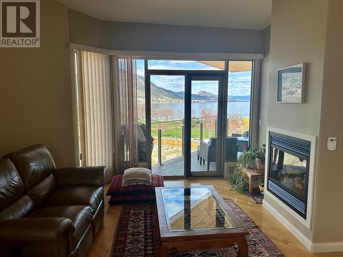 250 Marina Way Unit# 605, Penticton, BC - Indoor Photo Showing Living Room With Fireplace