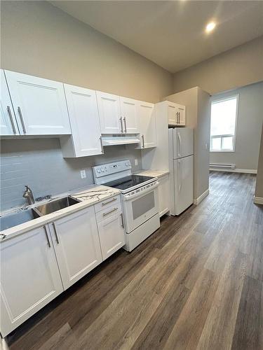 7 Mary Street|Unit #303, Hamilton, ON - Indoor Photo Showing Kitchen With Double Sink