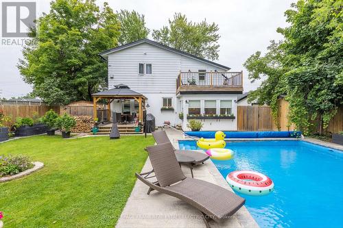 105 Clementi Street, Smith-Ennismore-Lakefield, ON - Outdoor With In Ground Pool With Backyard