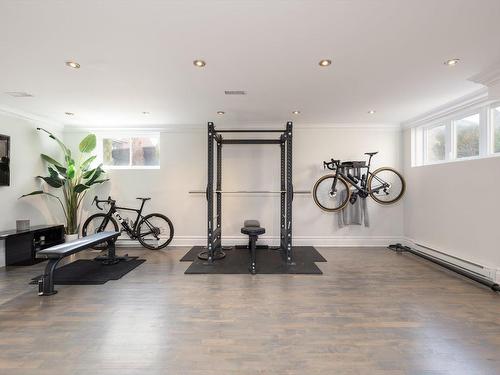 Sous-sol - 12 Rue Pierre-Trudeau, Dollard-Des-Ormeaux, QC - Indoor Photo Showing Gym Room