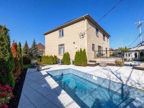 Cour - 12 Rue Pierre-Trudeau, Dollard-Des-Ormeaux, QC - Outdoor With In Ground Pool