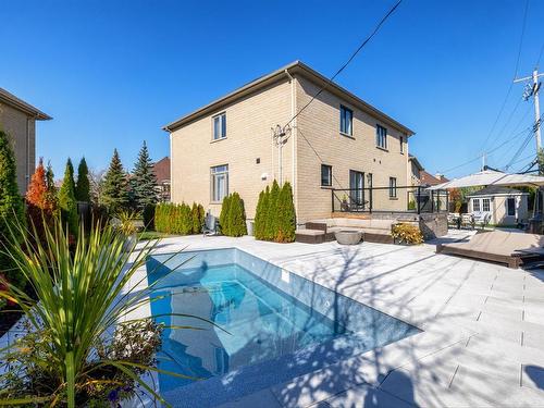 Piscine - 12 Rue Pierre-Trudeau, Dollard-Des-Ormeaux, QC - Outdoor With In Ground Pool With Deck Patio Veranda With Exterior