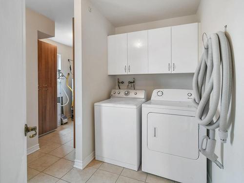Salle de lavage - 106-75 Rue Hubert-Aquin, Blainville, QC - Indoor Photo Showing Laundry Room