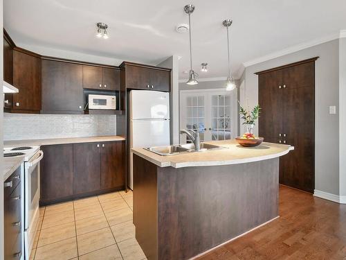 Kitchen - 106-75 Rue Hubert-Aquin, Blainville, QC - Indoor Photo Showing Kitchen With Double Sink