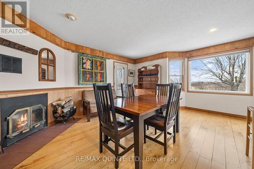 768 Melville Road, Prince Edward County, ON - Indoor Photo Showing Dining Room With Fireplace