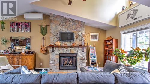 351 Hummingbird Avenue, Vernon, BC - Indoor Photo Showing Living Room With Fireplace