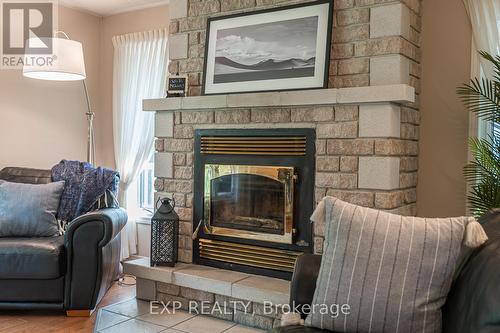168 Queens Bush Drive, Meaford, ON - Indoor Photo Showing Living Room With Fireplace