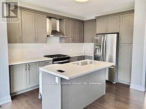 2 Periwinkle Rd, Springwater, ON - Indoor Photo Showing Kitchen With Upgraded Kitchen