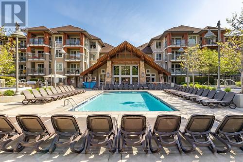 1093 Sunset Drive Unit# 105, Kelowna, BC - Outdoor With In Ground Pool