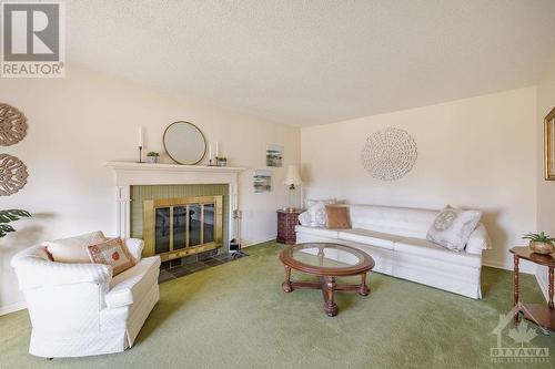 2097 Maywood Street, Ottawa, ON - Indoor Photo Showing Living Room With Fireplace
