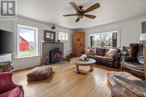 1232 South Shore Rd, Greater Napanee, ON - Indoor Photo Showing Living Room With Fireplace