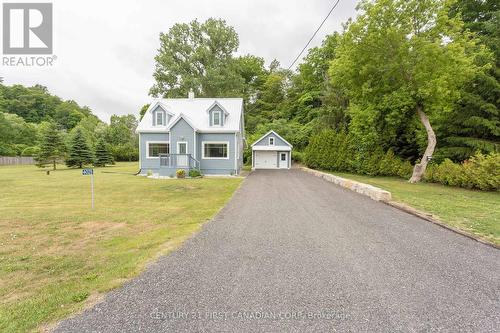 Front Exterior 3/4 acre - 4025 Union Road, Central Elgin (Port Stanley), ON - Outdoor With Facade