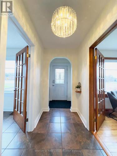 Centre Hall Plan -Front Foyer with French Doors - 4025 Union Road, Central Elgin (Port Stanley), ON - Indoor Photo Showing Other Room