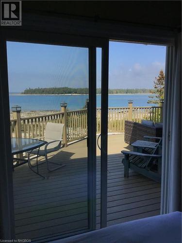 56 Silversides Point Drive, Northern Bruce Peninsula, ON - Outdoor With Body Of Water With Deck Patio Veranda With View