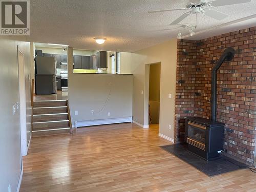 7818 Sage Drive, Coldstream, BC - Indoor Photo Showing Other Room With Fireplace