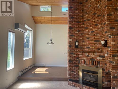 7818 Sage Drive, Coldstream, BC - Indoor Photo Showing Other Room With Fireplace