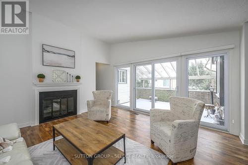 #44 -60 Fiddlers Green Rd, London, ON - Indoor Photo Showing Living Room With Fireplace