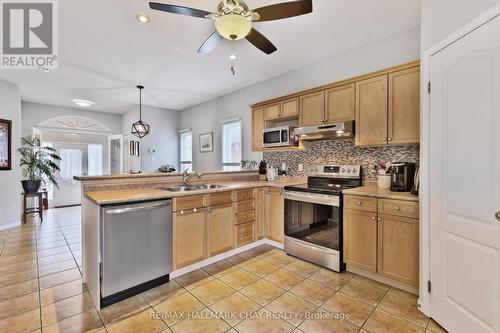 56 Wallace St, New Tecumseth, ON - Indoor Photo Showing Kitchen With Double Sink