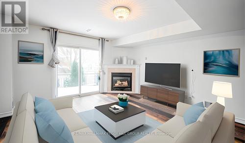 14 Revelstoke Crt, Barrie, ON - Indoor Photo Showing Living Room With Fireplace